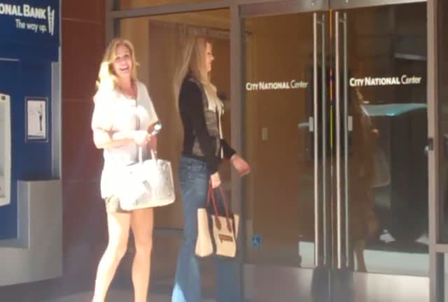 Shannon Tweed jokes with photographers whilst out with her sister in Beverly Hills