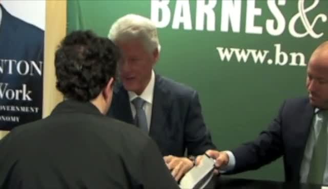 Bill Clinton Signs New Book For Two Young Fans And A Baby