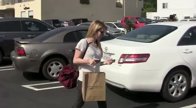 Emma Roberts Walking To Her Car With Shopping Bags