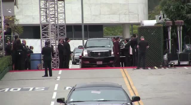 Ricky Gervais And George Clooney Greet Fans Outside Golden Globes