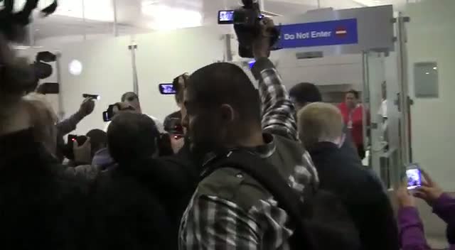 Kim Kardashian Snubs Photographers' Questions At LAX